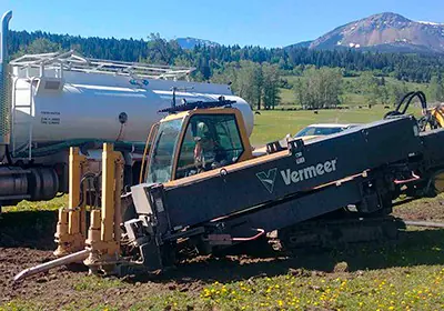 Syncore directional drilling equipment at an underground crossing job site